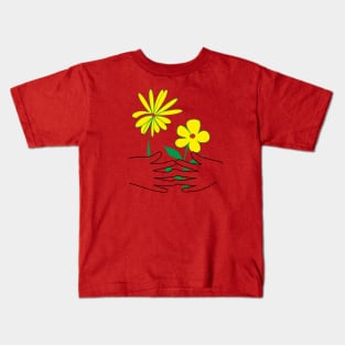 The hands holding flowers Kids T-Shirt